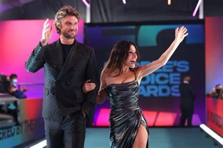 Adam Demos Poses with His OnScreen and RealLife Partner Sarah Shahi