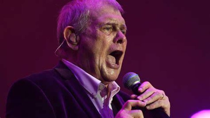 John Farnham likely to spend ‘weeks’ in hospital, will have tube put in