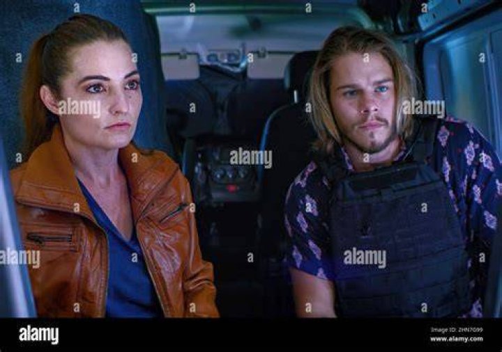 PURSUIT, from left Laurie Love, Jake Manley, 2022. © Lionsgate